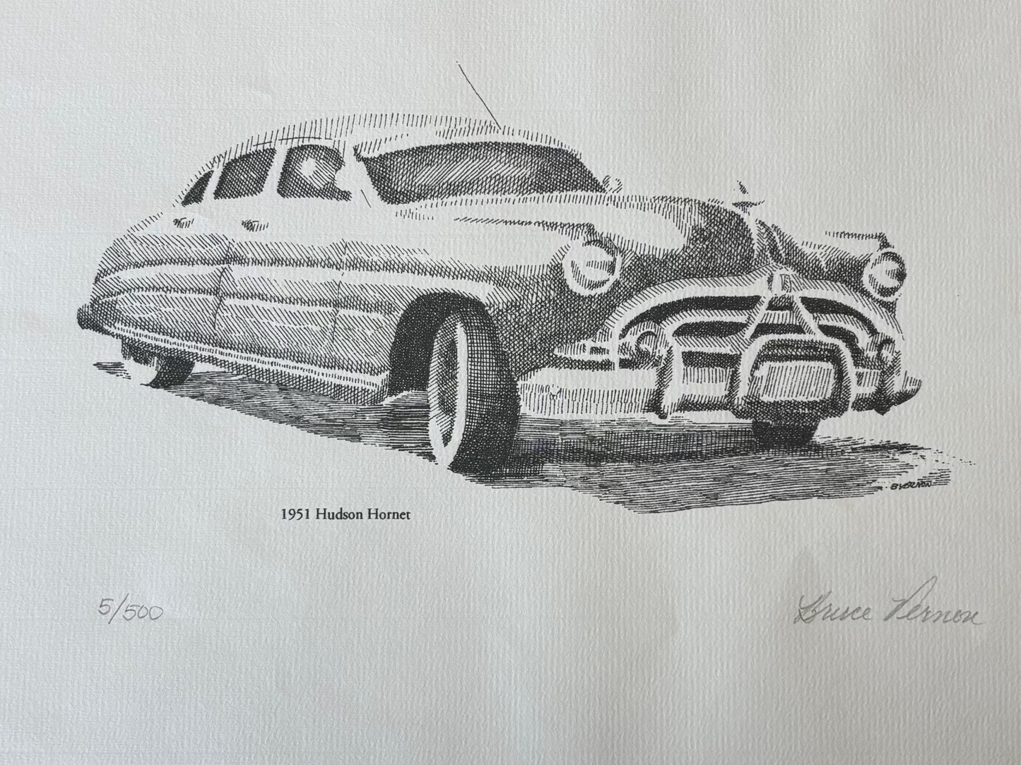 Black and white illustration of a car on a textured gray background