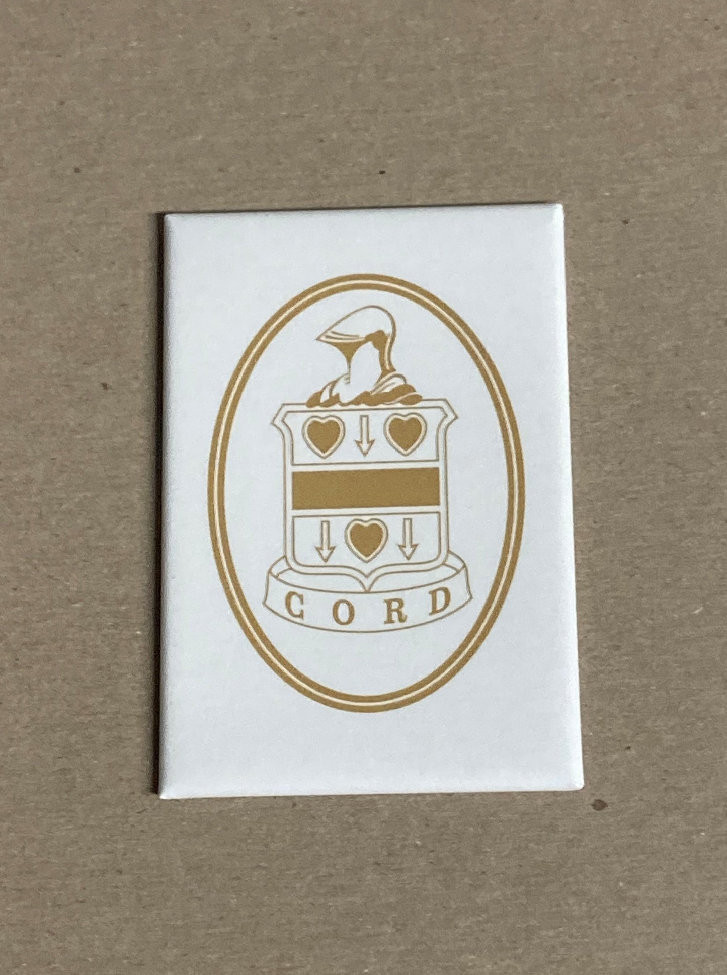 Cord Crest white/gold Magnet